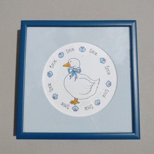 WHITE GOOSE ENCIRCLED WITH LOVE AND HEARTS PRINT IN BLUE METAL FRAME WITH MAT